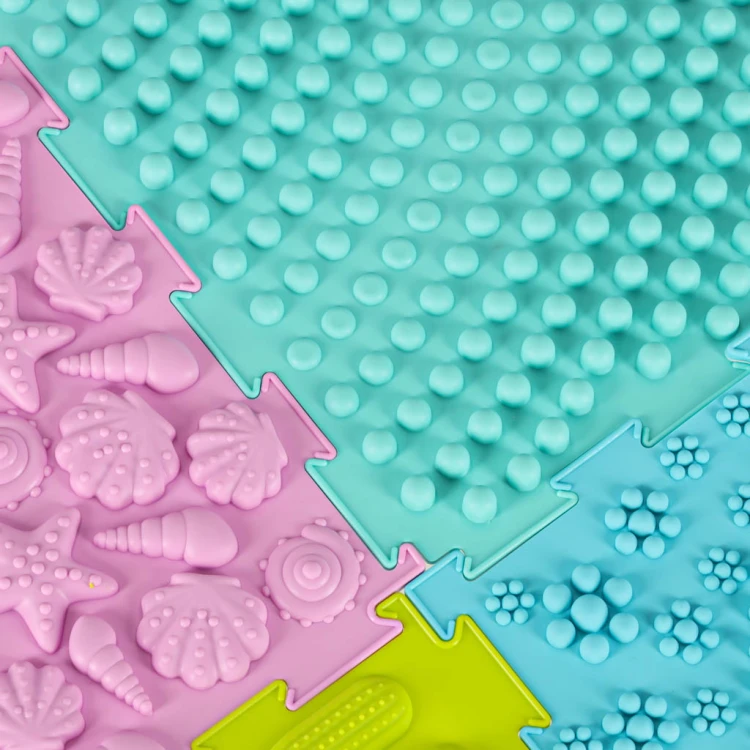 Mata sensoryczna puzzle montessori do masażu stóp 8 elementów pastelowe